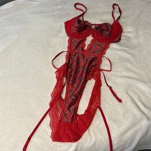 Red Victoria’s Secret Lingerie with Bow on front and garter straps size XL